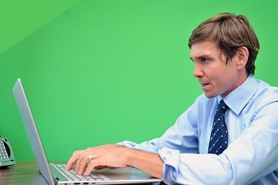 Baltimore corporate green screen photography for websites and content marketing. An attorney at his desk,