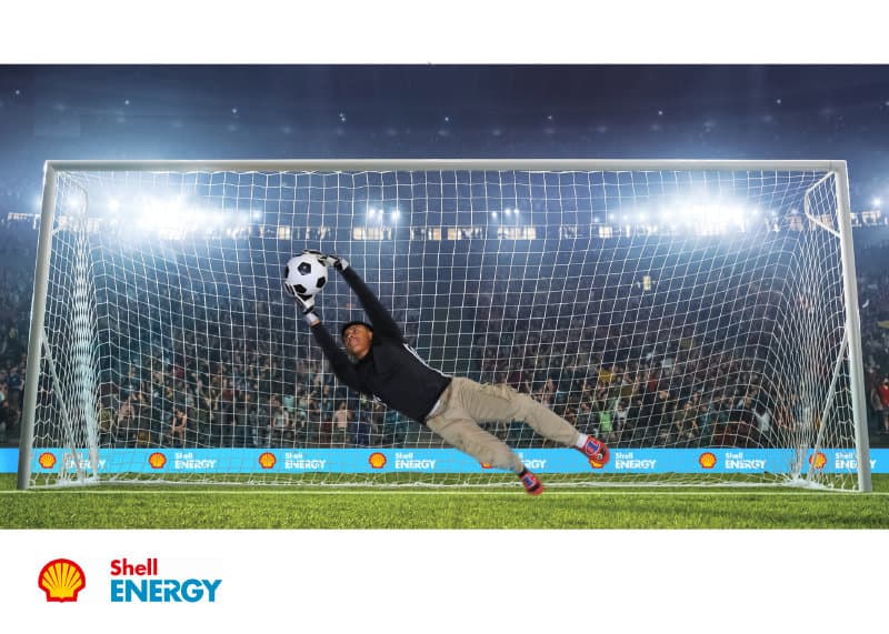 A Dallas green screen photo booth participant dives to save the goal at this Shell Energy Event.
