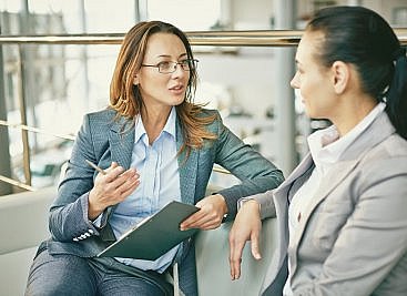 hiring manager asking candidate common interview questions