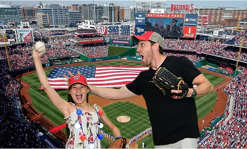 A girls snatches the ball from her father at this Washington, DC green screen photo booth featuring Nationals Baseball.