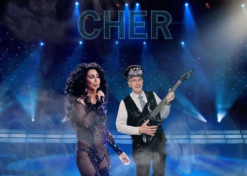 A participant "rocks on stage" with classic Cher in this Tampa green screen photo booths event.