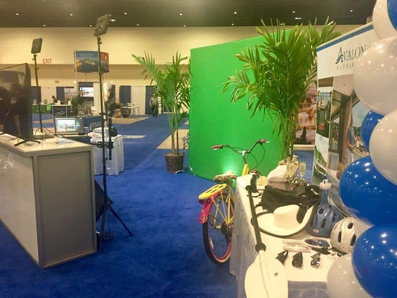 A Chicago experiential photo marketing booth at a local event featuring green screen photography