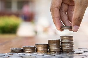 Recruitment CPH and management consultancy salary review - piles of coins