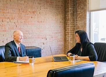 man answering interview questions