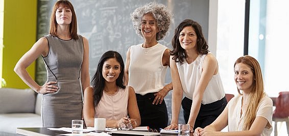 women in consulting meeting to discuss client business