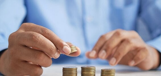 Management Consultancy Salaries 2023 - piles of coins