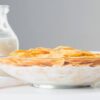 A-Homemade-Crunchy-Cornflake-Ice-Cream-Recipe-featured-image-200x596w-glass-bowl-of-cornflakes-with-glass-jar-of-milk-frosted-fusions