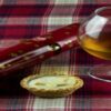 Festive-Fusions-Homemade-Brandy-and-Mince-Pie-Ice-Cream-featured-image-200x600w-mince-pie-and-glass-of-brandy-with-a-christmas-cracker-frosted-fusions