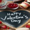 Valentines-Day-Ice-Cream-Dessert-Charcuterie-Board-Ideas-featured-image-637x1920w-large-wooden-board-with-a-selection-of-heart-shaped-biscuits-ice-cream-scoops-and-sprinkles-Frosted-fusions