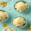 How To Thicken Homemade Ice Cream Naturally Without Eggs Or Stabilisers Featured Image top view of creamy banana and avocado ice cream bowls with honey drizzle Frosted Fusions