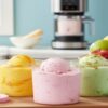 Ninja-Creami-Anything-Goes-Recipes-Featured-Image-colourful-tinned-fruit-peach-mango-sorbet-creamy-desserts-and-soft-serve-Frosted-Fusions