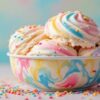Rainbow-Ripple-Funfetti-Ice-Cream-Featured Image-Marbled-rainbow-ice-cream-scoops-in-colourful-bowl-with-sprinkles-Frosted-Fusions
