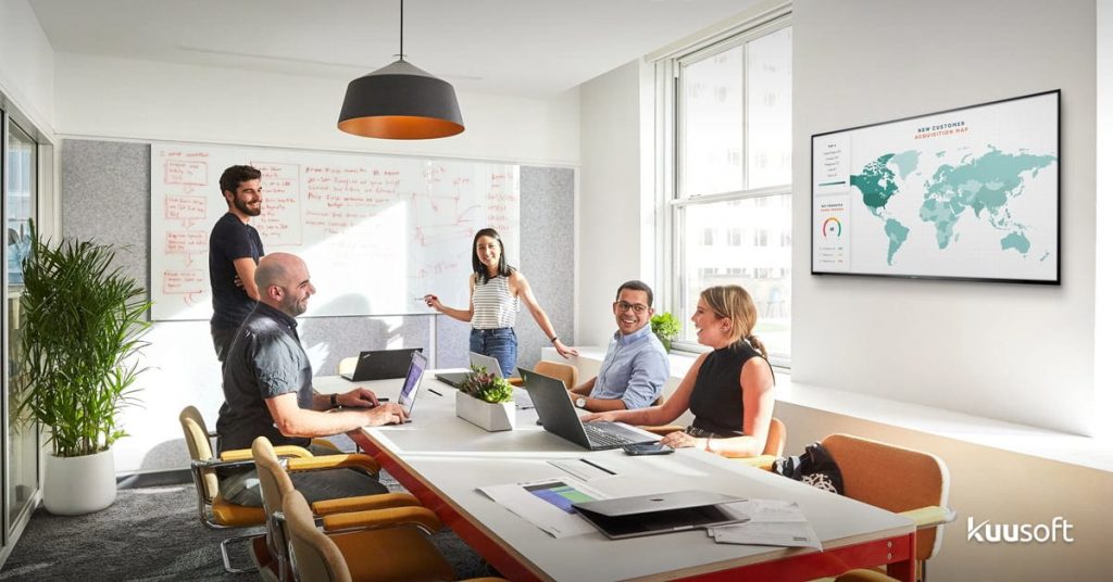 an office meeting room on digital signage
