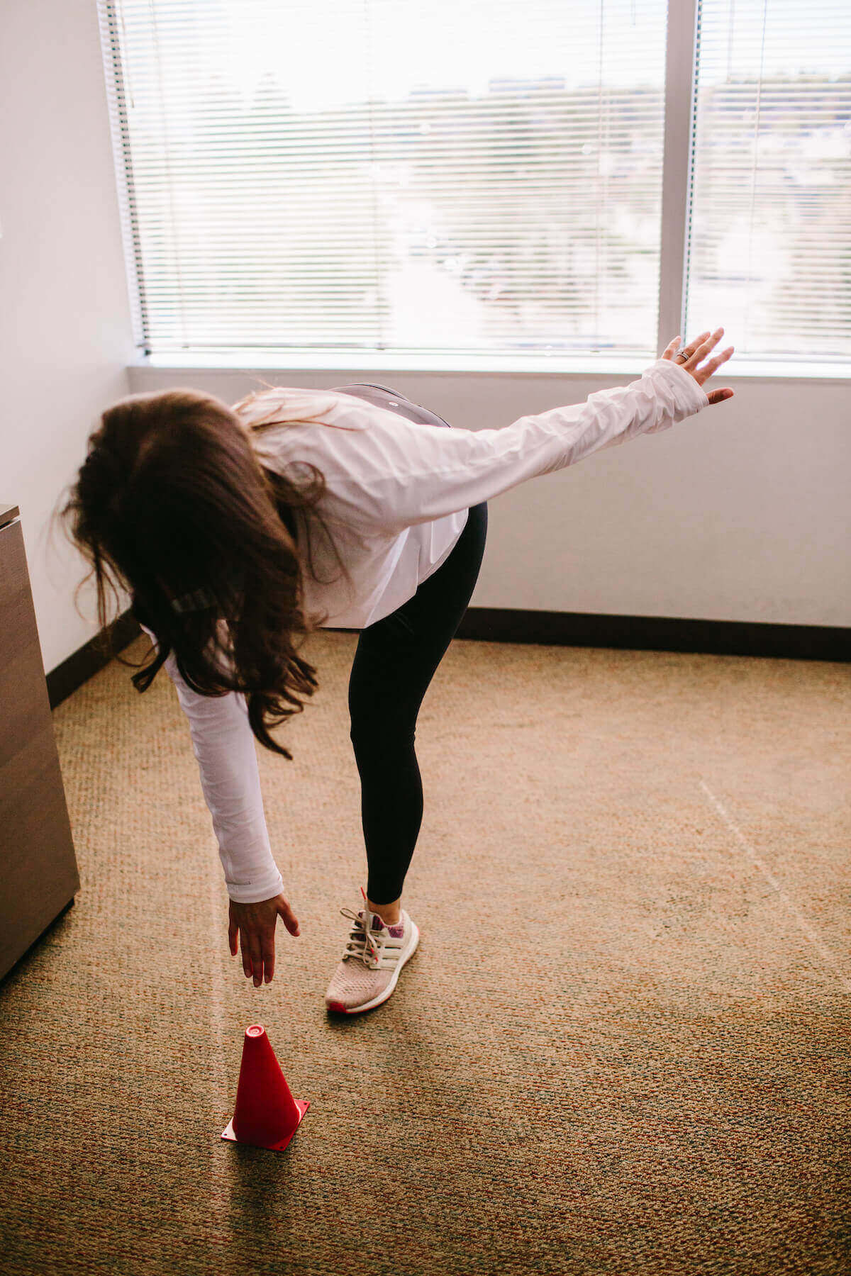 patient stretching during vestibular therapy