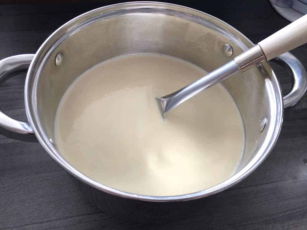 Nalesniki batter in a large pot.