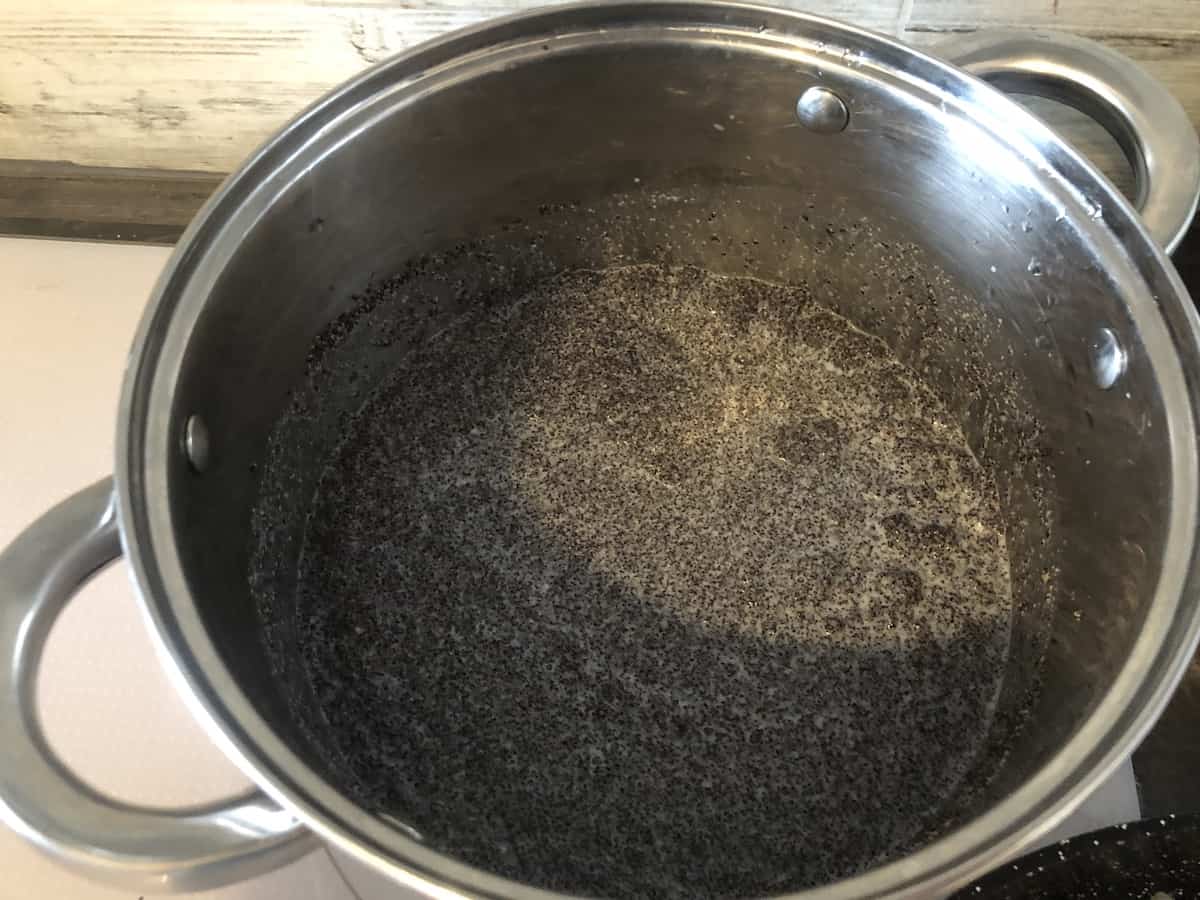 Poppy seeds soaking in milk.