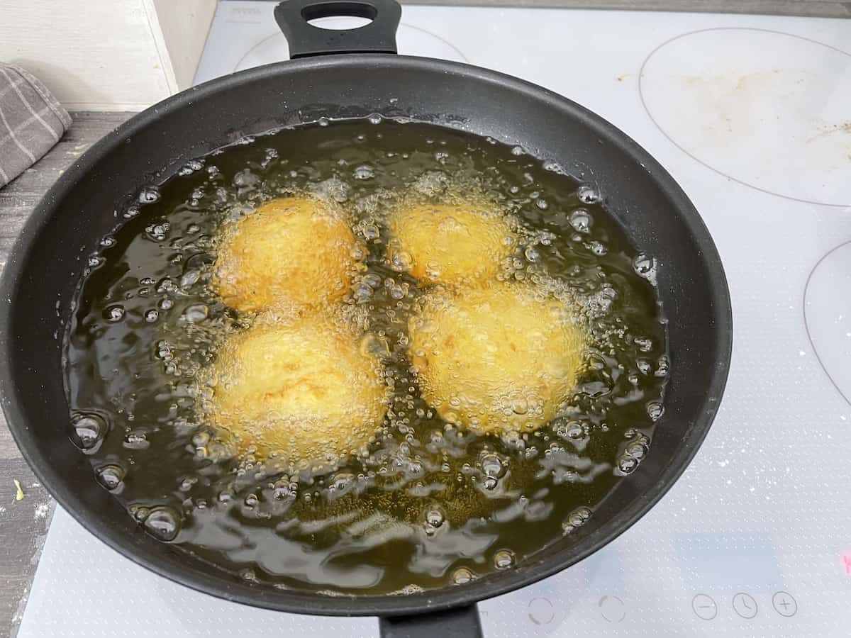 Fry the donuts in oil.