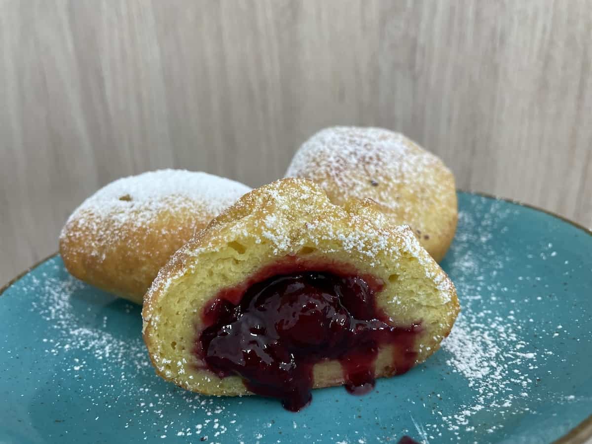 Jam filled Kuyavian potato donuts.