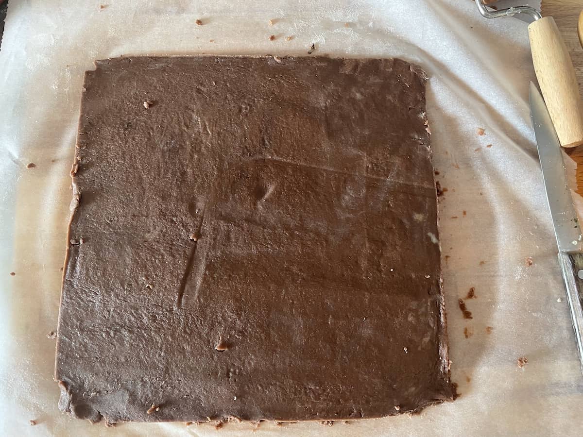 A Polish Easter chocolate mazurek on a baking sheet.