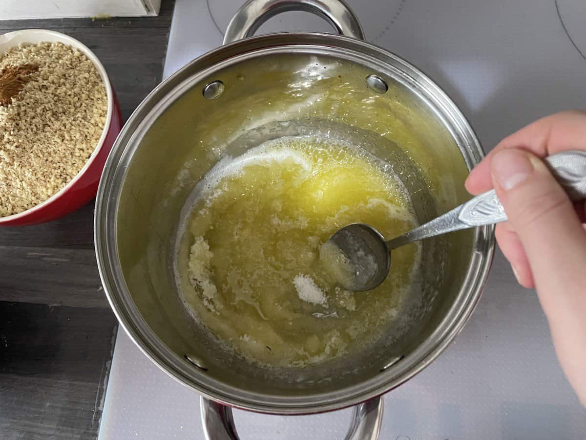 Melt the butter and the sugar for the Polish nut roll.