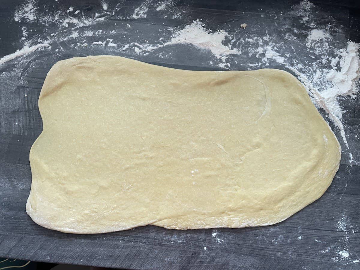 Roll out the dough onto a floured surface.