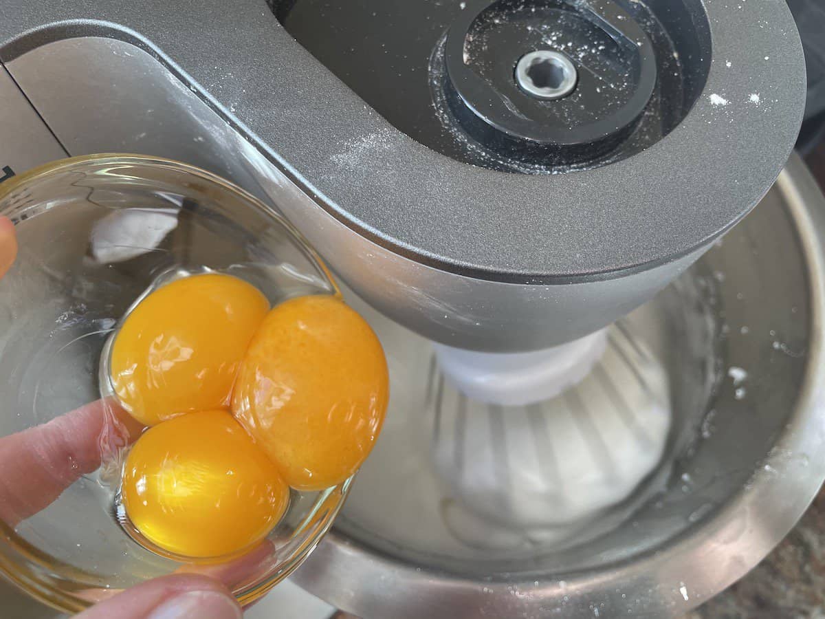 Add the egg yolks.