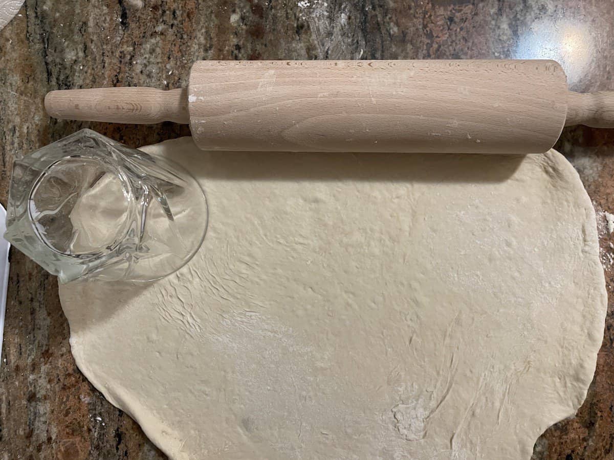 Cut circles in the dough.