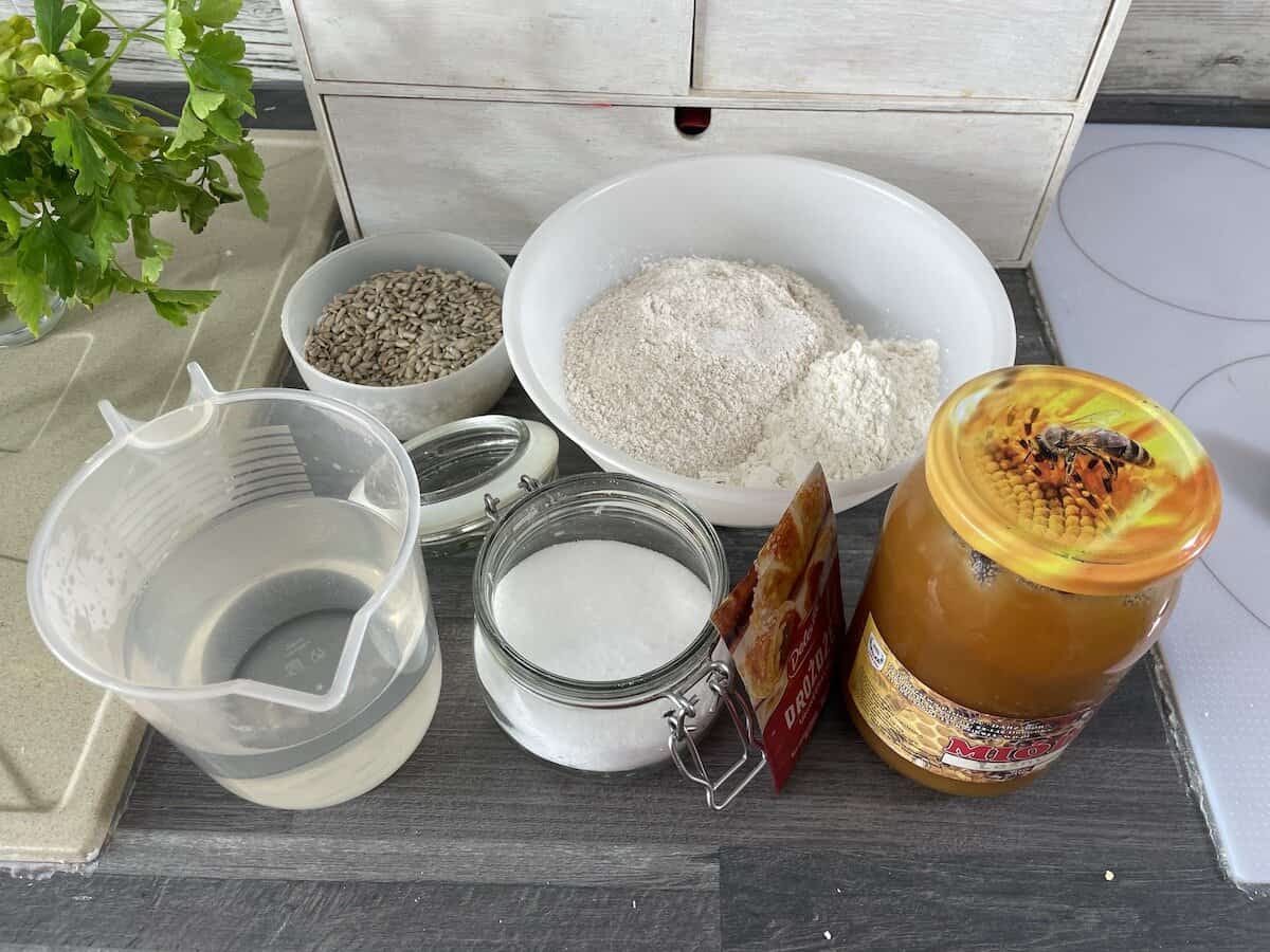 Knead the ingredients for Polish sunflower seed bread.