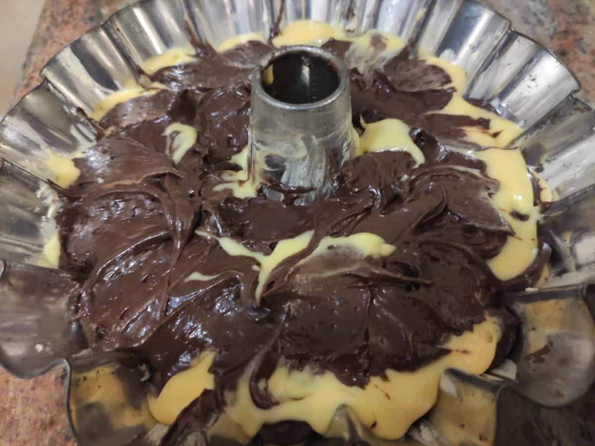 A bundt pan with chocolate icing, polish food.