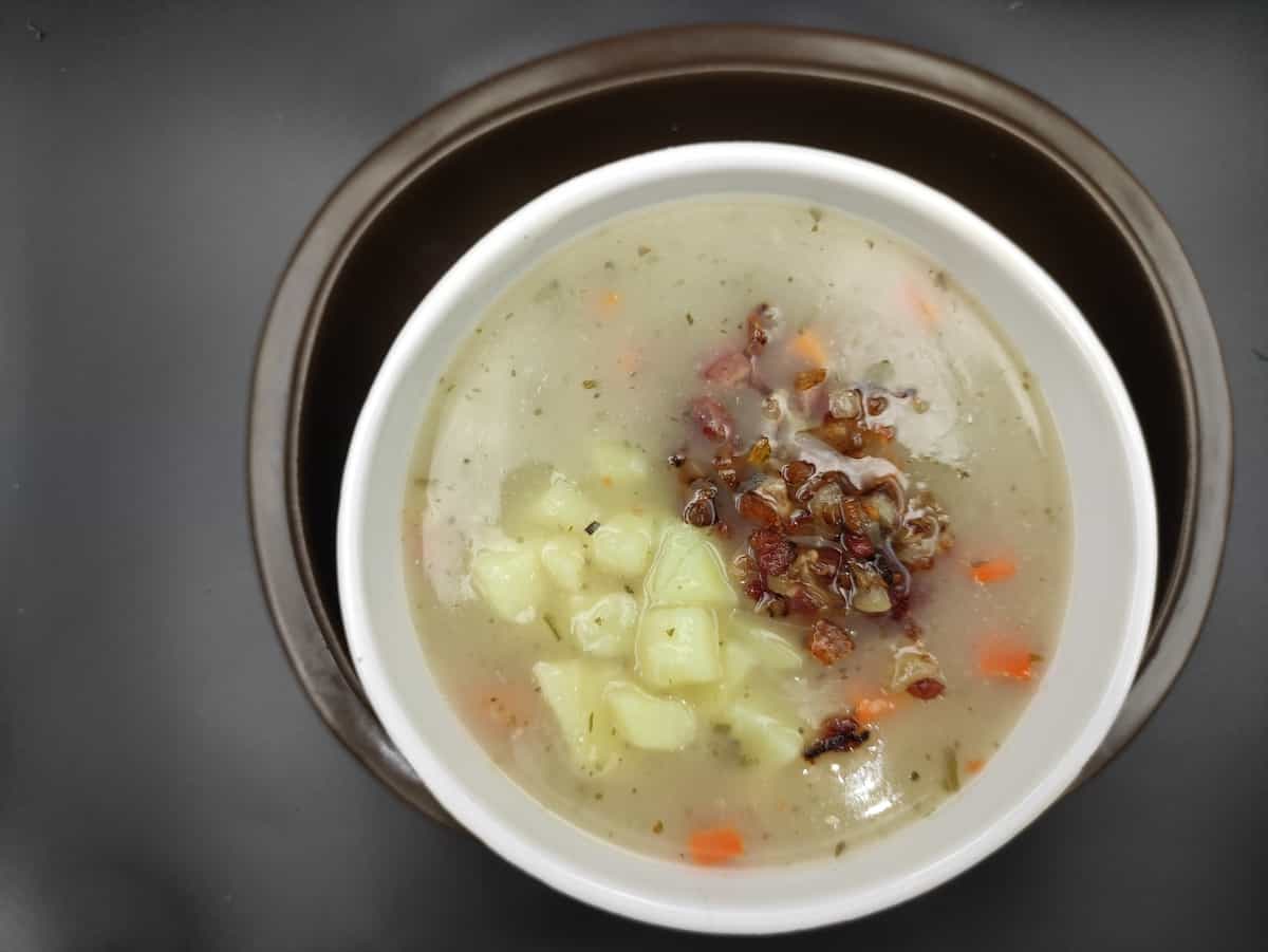 Polish vegan zurek in a white bowl.
