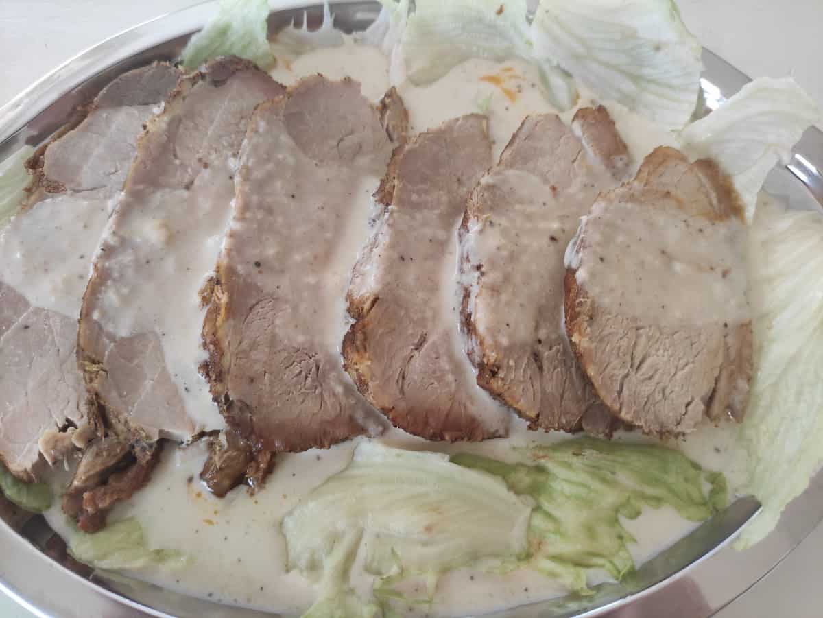 Polish pork tenderloin in a dish.