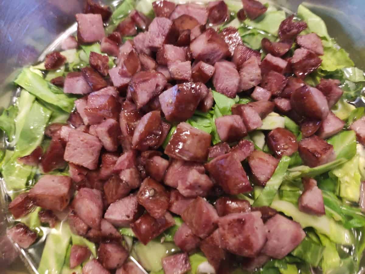 Fried kielbasa added to the cabbage soup.