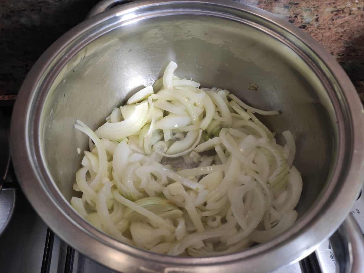 Chopped onions in a pot.