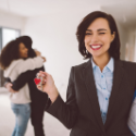 Real estate agent assisting home sellers during a successful sale