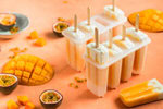 Fun-Easy-Homemade-Ice-Lollies-Popsicles-—-The-Perfect-Summer-Treat-image-2-mango-and-passion-fruit-ice-lollies-with-fresh-mango-and-passion-fruit-Frosted-Fusions