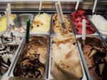 Celebrating-National-Ice-Cream-Month-And-The-Worlds-Love-Affair-With-Ice-Cream-image-2-trays-of-different-flavoured-Gelato-with-scoops-Frosted-Fusions
