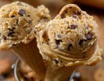easy-homemade-cookie-dough-ice-cream-recipe-image-3-two-ice-cream-cones-with-scoops-of-cookie-dough-ice-cream-frosted-fusions