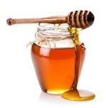 Honey & Mustard Ice Cream – A Unique, Sweet & Savoury Scoop! image 3 glass jar of honey with drizzler placed on top white background Frosted Fusions