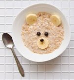 How To Fix Ice Cream That’s Too Sweet (or Not Sweet Enough) image 1 top view of bowl of porridge with fruit shaped bear face Frosted Fusions