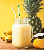 how-to-make-the-perfect-smoothie-image-11-fresh-pineapple-bananas-coconut-and-orange-and-smoothie-with-straws-frosted-fusions