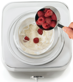 Cuisinart ICE-30BC Ice Cream Maker - A Detailed Review image 2 top view of cuisinart ice-30bc ice cream maker with ice cream churning and raspberries being added into chute frosted fusions
