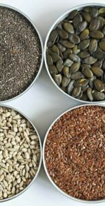 can-i-give-my-baby-ice-cream-image-7-selection-of-seeds-in-dishes-top-view-rotated-frosted-fusions