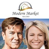 Modern Market REALTORS® logo above portraits of Jim Christl and Shannon Barnum with a cityscape in the background