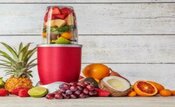 new-year-fresh-vibes-nourish-your-body-with-healthful-smoothies-5-blender-full-of-fresh-fruit-with-huge-selection-of-fresh-fruits-surrounding-the-blender-frosted-fusions