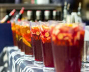 anyone-for-pimms-homemade-pimms-and-lemonade-ice-cream-image-3-several-large-jugs-of-pimms-and-lemonade-lined-up-on-a-table-frosted-fusions