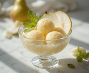 Why Dont We See Apple Ice Cream And Clever Ways To Make It Work image 4 Homemade pear sorbet scoops in glass dessert bowl with fresh pear slice and mint garnish Frosted Fusions