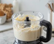 How-To-Fix-Icy-Homemade-Ice-Cream-And-Prevent-It-Next-Time-Image-1-freshly-churned-vanilla-ice-cream-in-food-processor-Frosted-Fusions How-To-Fix-Icy-Homemade-Ice-Cream-And-Prevent-It-Next-Time-Image-1-freshly-churned-vanilla-ice-cream-in-food-processor-Frosted-Fusions