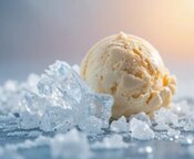 How-To-Fix-Icy-Homemade-Ice-Cream-And-Prevent-It-Next-Time-Image-7 Close-up of ice crystals beside a creamy scoop of vanilla ice cream showing contrast icy and smooth textures Frosted Fusions How-To-Fix-Icy-Homemade-Ice-Cream-And-Prevent-It-Next-Time-Image-7 Close-up of ice crystals beside a creamy scoop of vanilla ice cream showing contrast icy and smooth textures Frosted Fusions