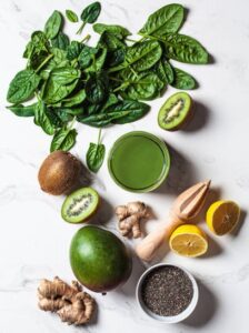 What-Smoothie-Is-Best-For-The-Immune-System-image-3-selection-of-superfoods-ginger-spinach-limes-chia-seeds-Frosted-Fusions