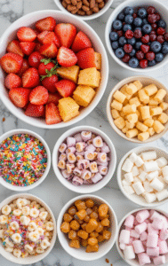 Sundae Funday – Your Guide To Creating A DIY Ice Cream Bar At Home image 3 selection of fruits in white bowls top view Frosted Fusions